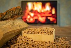 Heating a wood stove with pellets in the foreground - an economical concept of the heating system
